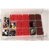 Image 4 : Four plastic containers filled with body parts and accessories for Minifigures