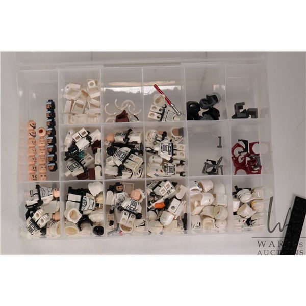 Large selection of Lego Star Wars Stormtrooper and Clone Trooper parts including karmas, Visors, Ran