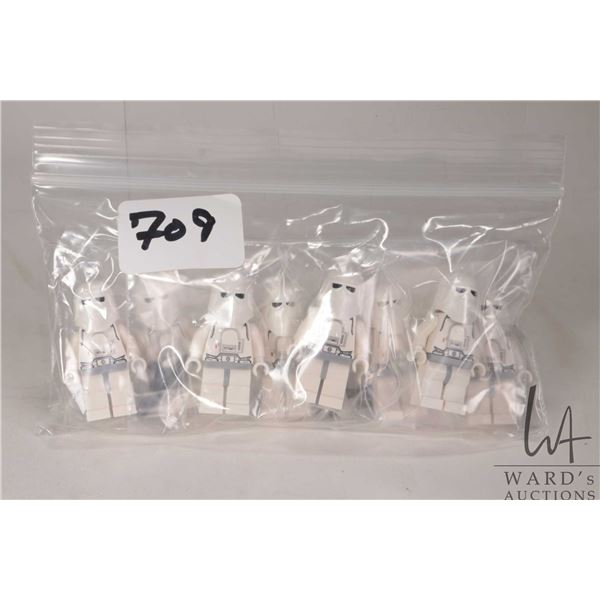 Eight Lego Star Wars Snowtrooper minifigures.