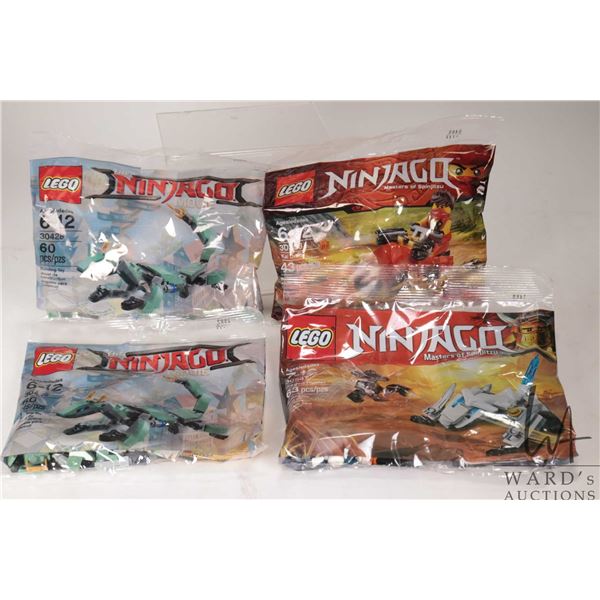 Four Lego Ninjago Polybags including Dragon Hunter, Kai Drifter, and 2 Green Ninja Mech Dragons,