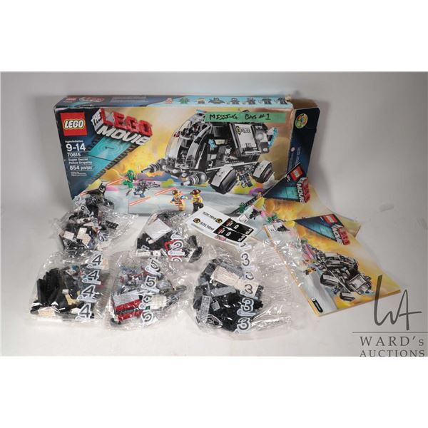 Lego-The Lego Movie "Super Secret Police Dropship" no. 854. Factory sealed bags, missing bag no. 1. 