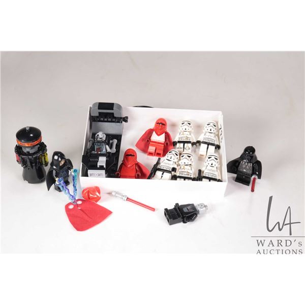 Selection of Lego Star Wars minifigures including 2 Darth Vaders, Darth Vader transformation, 3 Stor