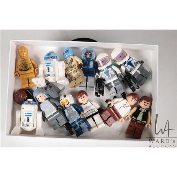 Selection of Lego Star Wars minifigures including C3P0, R2-D2, Han solo (Stormtrooper), 2 Han Solos,