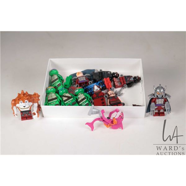 Selection of Lego Teenage Mutant Ninja Turtles minifigures including Rapheal, Donatello, Leonardo, m
