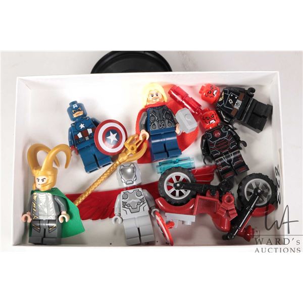 Selection of Lego Marvel Super Heros minifigures including Iron Skull, Red Skull, Thor, Captain Amer