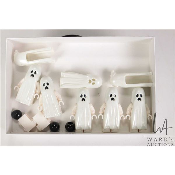 Selection of Lego minifigures including 5 full ghost, three ghost headpieces, etc.