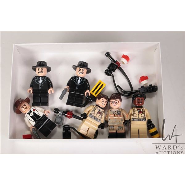 Selection of Lego movie theme minifigures including Indiana Jones, 2 Shanghai Gangsters, Winston Zed