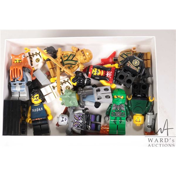 Selection of Lego Ninjago minifigures including Lloyd (gold), Shark Army Octopus, Shark Army Angler,