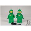 Image 1 : Two Lego Classic Space minifigures from the EXO SUIT No. 21109. Classic Green Spaceman with airtanks