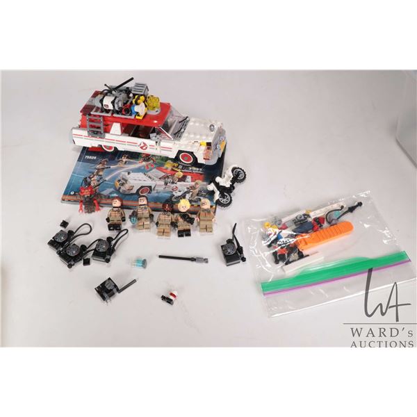 Lego Ghostbusters set Ecto 1 & 2 No. 75828 pre built kit with minifigures and manual. NOTE: Legs on 