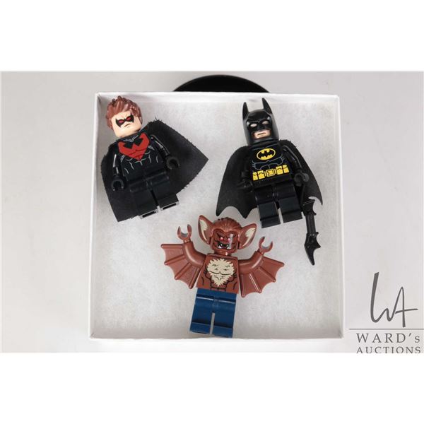 Three Lego DC Super Heros minifigures Batman, Man-Bat, Nightwing