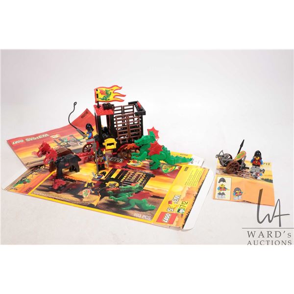 Two prebuilt Lego "Castle" sets including Dragon Wagon No. 6056 with 2 minifigures, original box and