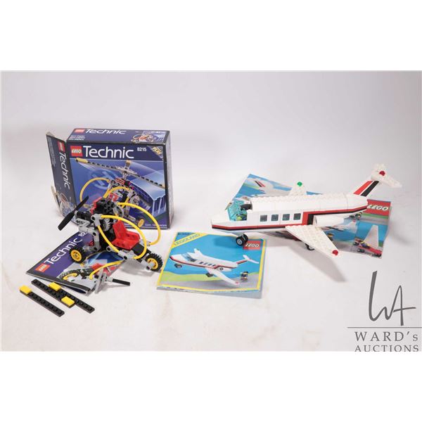 Two prebuilt Lego kits including Gyro Copter No. 8215, and Jet Airliner No. 6368. Completeness not g