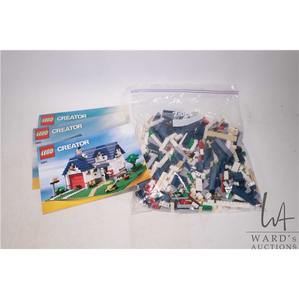 Lego "Creator" Apple Tree House No. 5891 with manual. Completeness not guaranteed or confirmed. Bid 