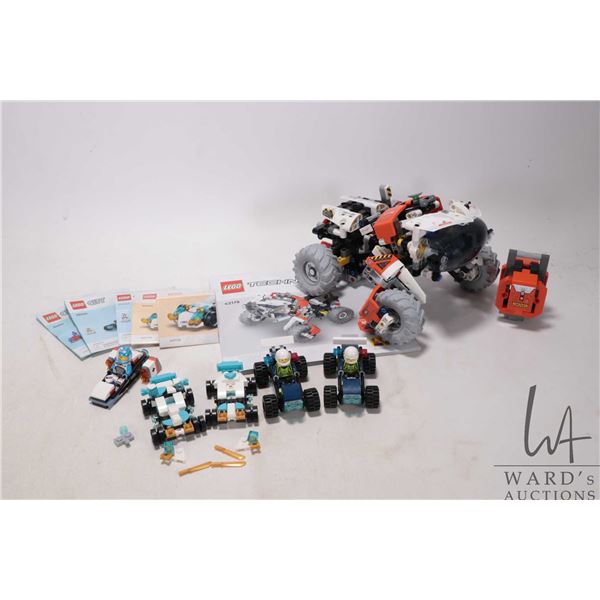 Six prebuilt Lego Sets including Surface Space Loader LT78 No. 42178 with manual, two Zane's Dragon 
