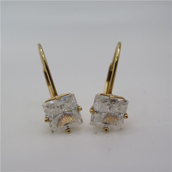 14K Yellow gold earrings with clear stone.  Super shiny!  Marked 14K on arm