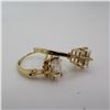Image 2 : 14K Yellow gold earrings with clear stone.  Super shiny!  Marked 14K on arm