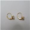 Image 5 : 14K Yellow gold earrings with clear stone.  Super shiny!  Marked 14K on arm