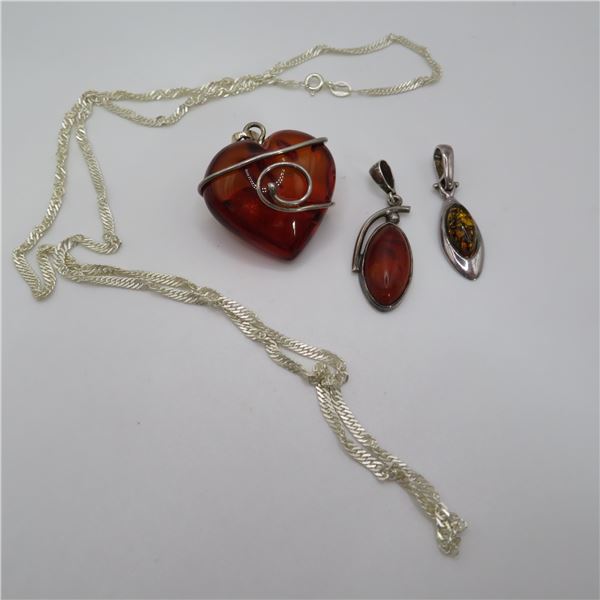 925 23" chain with three Amber colored stone pendants.  All marked 925