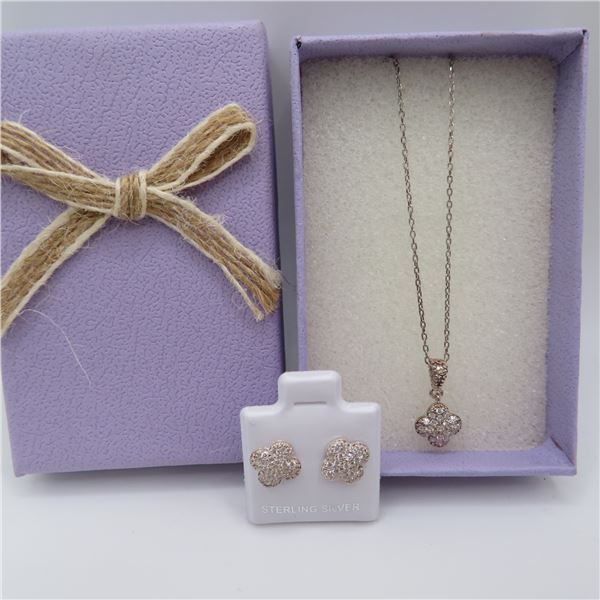 Sterling Silver gift set in box.  Includes chain with pendant and matching earrings.  Very nice!