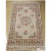 Image 1 : A Chinese Floral Wool Rug.