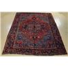 Image 1 : An Antique Persian Heriz Wool Rug.