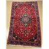 Image 1 : A Persian Mashad Wool Rug.