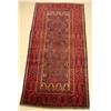 Image 1 : A Semi Antique Persian Baluch Wool Rug.