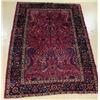 Image 1 : An Antique Persian Mashad Wool Rug.