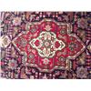 Image 2 : A Persian Tabriz Wool Rug.