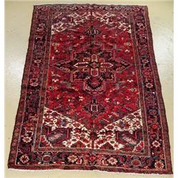 A Semi Antique Persian Heriz Wool Rug.