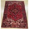 Image 1 : A Semi Antique Persian Heriz Wool Rug.