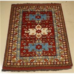 A Persian Khorasan Wool Rug with Animal Motif.