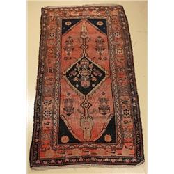 An Antique Persian Malayer Wool Rug.