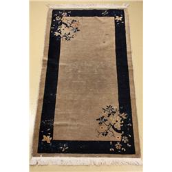 An Antique Chinese Peking Wool Rug.