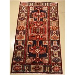 A Persian Bakhtiari Wool Rug.