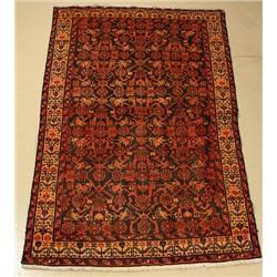 A Persian Malayer Wool Rug.