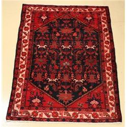 A Persian Hamadan Wool Rug.