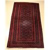 Image 1 : A Semi Antique Persian Baluch Wool Rug.
