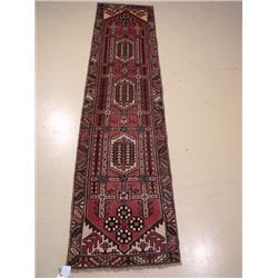 A Persian Karajeh Wool Runner.