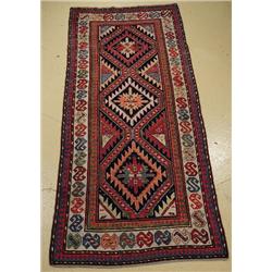 An Antique Geudge Caucasian Wool Rug.