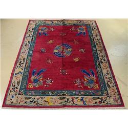 An Antique Chinese Peking Wool Rug.