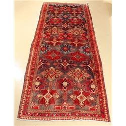 A Semi Antique Persian Heriz Wool Runner.