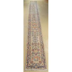 An Antique Persian Kirman Wool Runner.