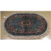 Image 1 : A Chinese Oval Wool Rug with Back Cover,