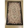 Image 1 : An Old Hooked Wool Rug.