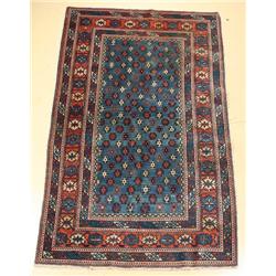 A Semi Antique Caucasian Wool Rug.