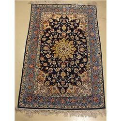 A Persian Isfahan Silk and Wool Rug.