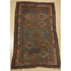 An Antique Caucasian Wool Rug.