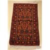 Image 1 : A Persian Baluch Wool Rug.